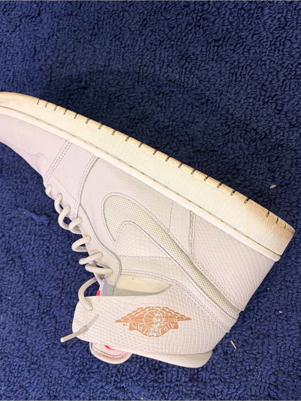Nike Women’s White High-Top Sneakers with Gold Accent